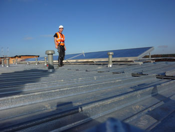 Installing solar panel in one of Scotlands domestic homes